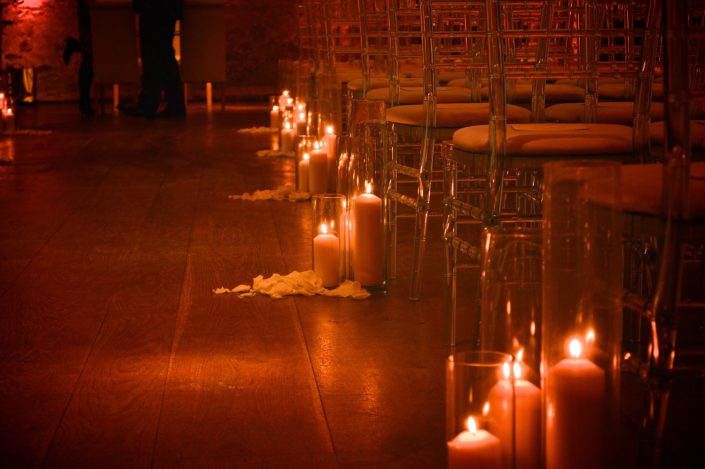 Notley Abbey wedding event lighting - uplighting, fairylight canopy, draping, chandaliers
