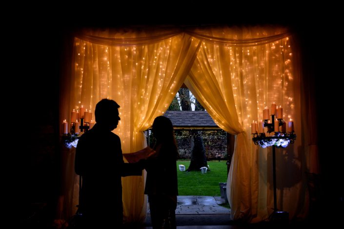 Notley Abbey wedding event lighting - uplighting, fairylight canopy, draping, chandaliers