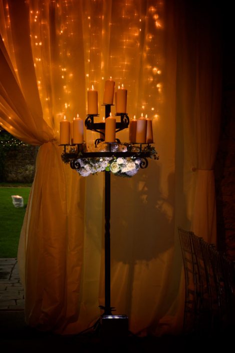 Notley Abbey wedding event lighting - uplighting, fairylight canopy, draping, chandaliers