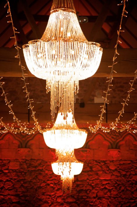 Notley Abbey wedding event lighting - uplighting, fairylight canopy, draping, chandaliers