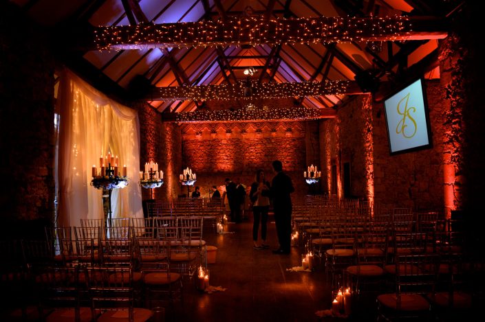 Notley Abbey wedding event lighting - uplighting, fairylight canopy, draping, chandaliers