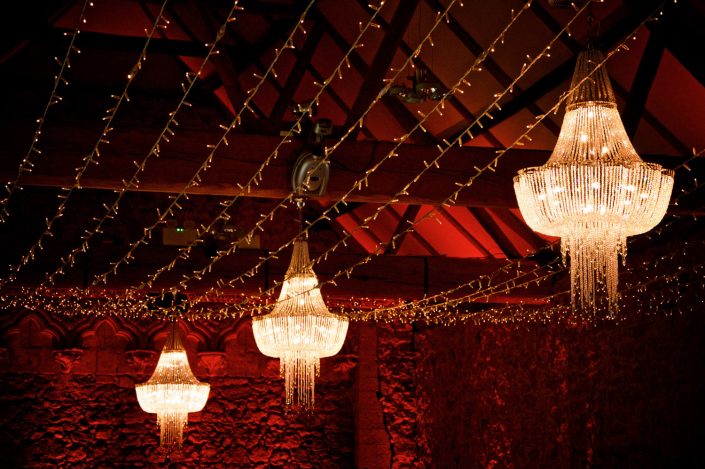 Notley Abbey wedding event lighting - uplighting, fairylight canopy, draping, chandaliers