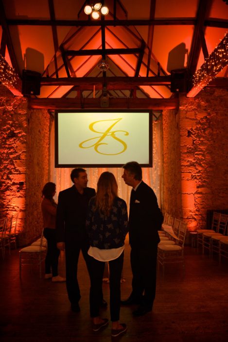 Notley Abbey wedding event lighting - uplighting, fairylight canopy, draping, chandaliers