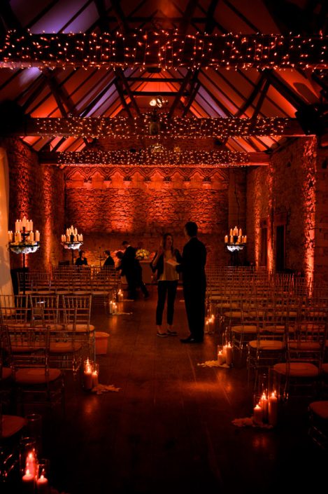 Notley Abbey wedding event lighting - uplighting, fairylight canopy, draping, chandaliers