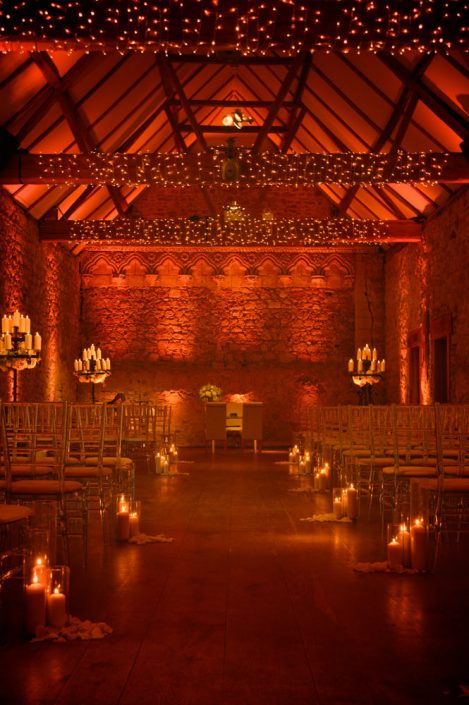 Notley Abbey wedding event lighting - uplighting, fairylight canopy, draping, chandaliers