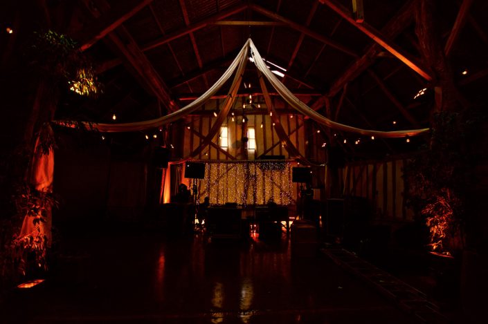 Alpheton Hall Barn wedding party lighting, festoon, fairylights, candles, draping