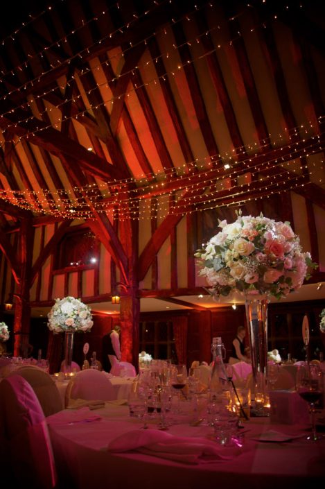 Great Fosters wedding party lighting design - fairylight canopy - uplighting and pinspotting