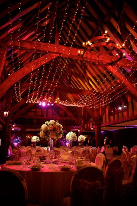 Great Fosters wedding party lighting design - fairylight canopy - uplighting and pinspotting