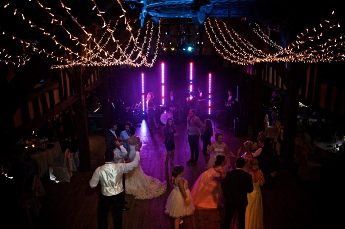 Great Fosters wedding party lighting design - fairylight canopy - uplighting and pinspotting
