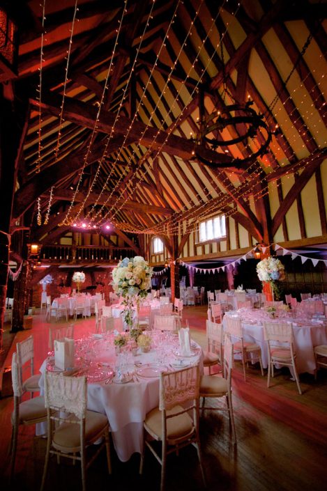 Great Fosters wedding party lighting design - fairylight canopy - uplighting and pinspotting